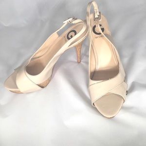 Strappy peep toe nude Guess heels.